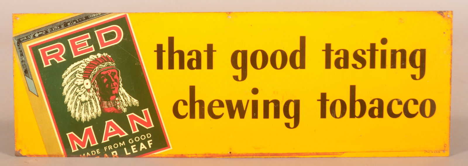 Red Man Chewing Tobacco Tin Tacker Sign. (1 of 2)