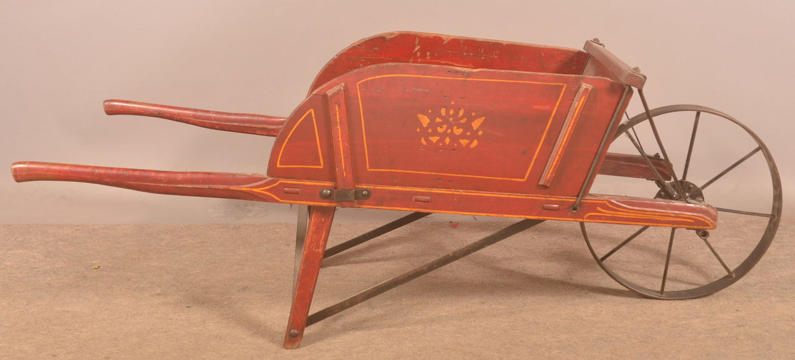 Buch No. 4 Painted & Stenciled Wheelbarrow.: Excellent size No. 4 with Buch Elizabethtown, PA stenciled on the front. Steel front wheel. Removable sides. Provenance: James Hoffman Collection. 19"H x 56"L x 17"W