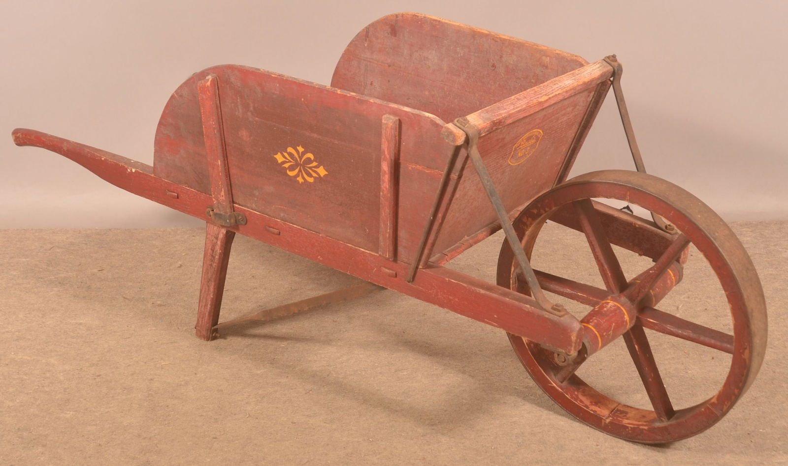 Buch No. 3 Painted & Stenciled Wheelbarrow.: Stenciled on the front panel from Elizabethtown, PA. Heavy wood wheel with thick steel rim. Provenance: James Hoffman Collection. 25"H x 65"L x 21-1/2"W