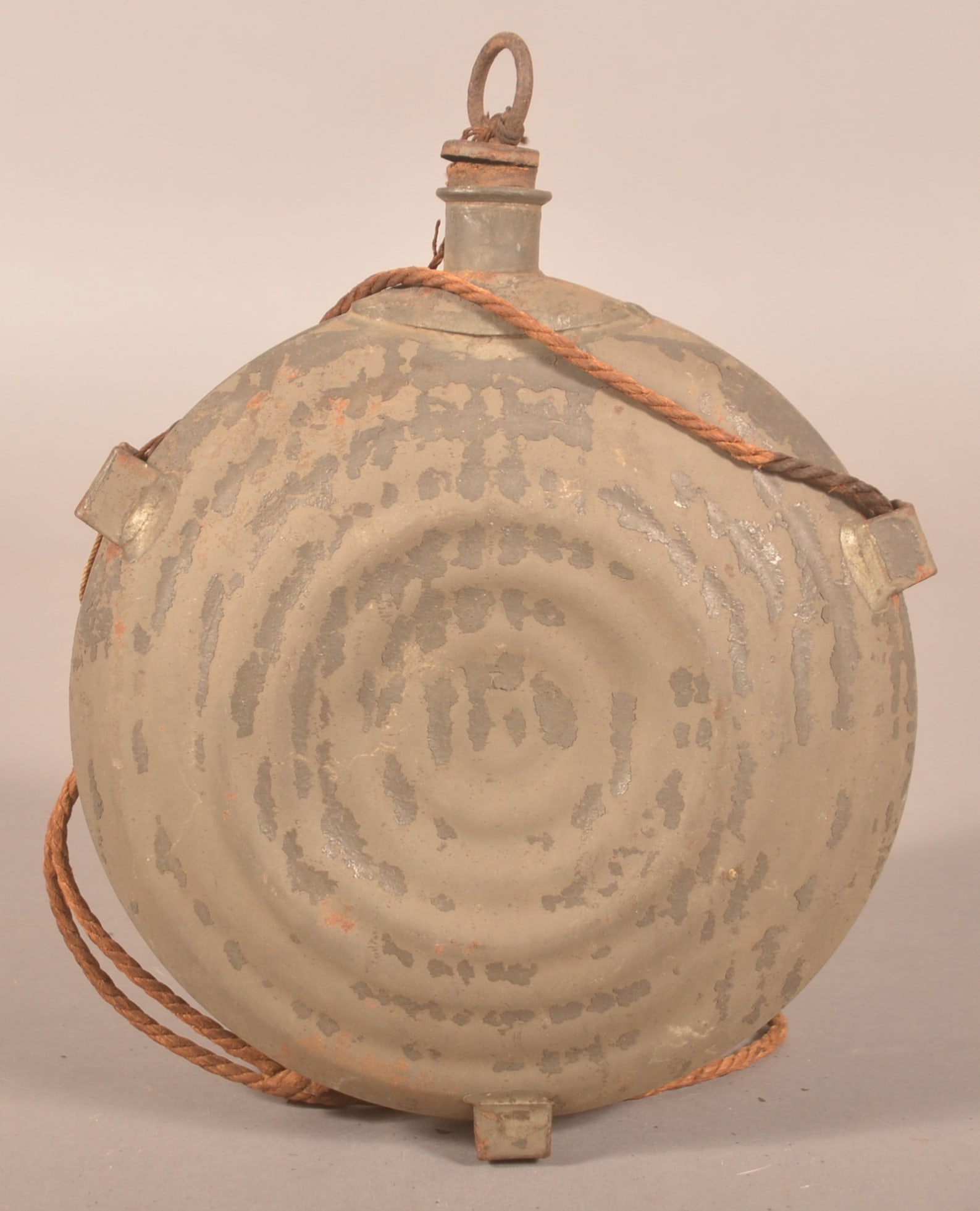 Civil War Bullseye Canteen.: Original canteen with cork and stopper, missing cloth cover. Twisted rope strap is an old replacement. Marked Porter and Booth Philadelphia on the neck. 10"H x 8"D