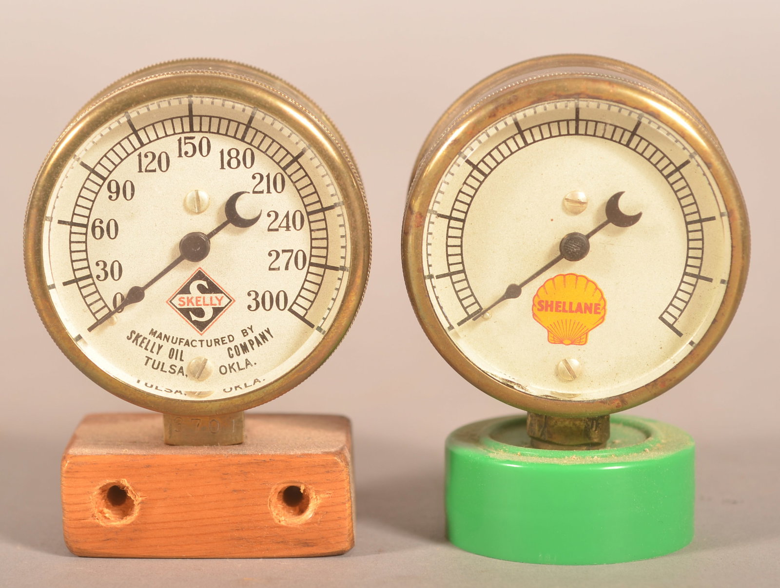 Unusual Shellane & Skelly Gas/Oil Gauges.: Vintage gauges one from Shellane (Philippine Gas Company) and the other from Skelly Oil Company from Tulsa, OK. 2-1/4" D