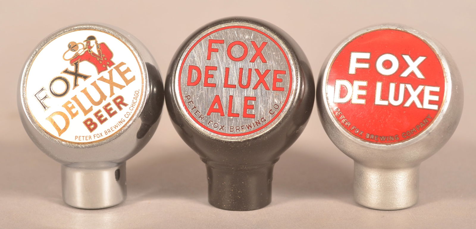 Group of Fox De Luxe Vintage Beer Taps.: Three taps including Fox De Luxe Beer, Fox De Luxe Ale, and Fox De Luxe. All marked Peter Fox Brewing Co. 2-1/4"H