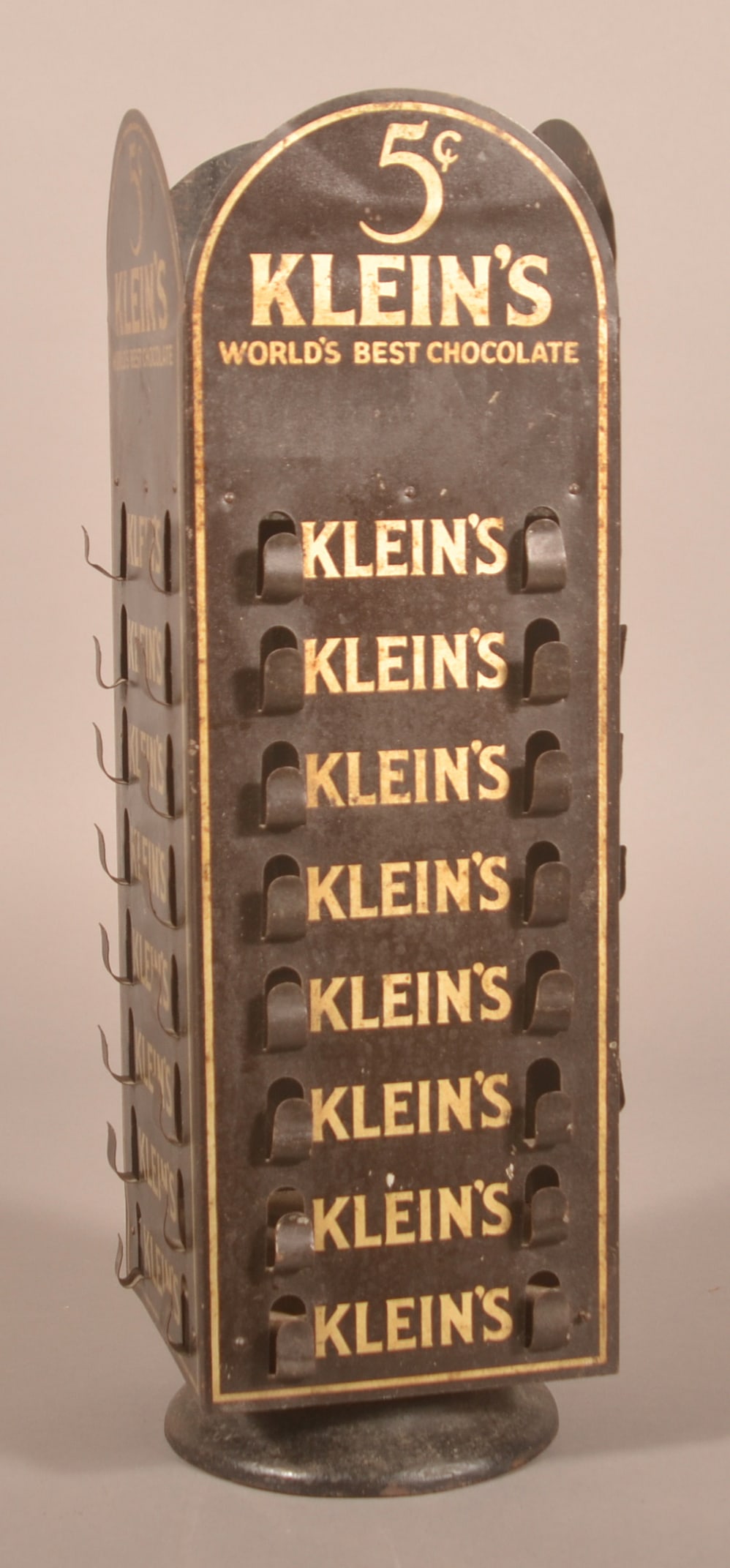 Klein's Revolving Tin Chocolate Bar Store Display.: Always popular with collectors and somewhat difficult to find. Very nice display in as-found condition. Provenance: James Hoffman Collection. 19"H x 7"W x 7"D