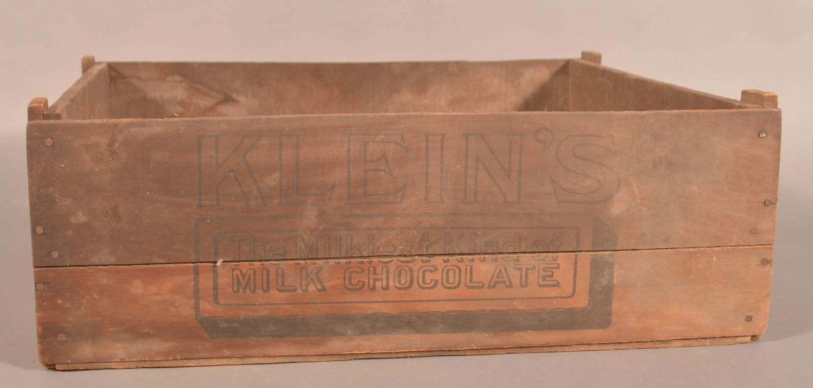Early Wood Klein's Chocolate Shipping Crate.: Stenciled on both sides. Pine boards with round nail construction. Provenance: James Hoffman Collection. 9-1/2"H x 28-1/4"W x 23"D