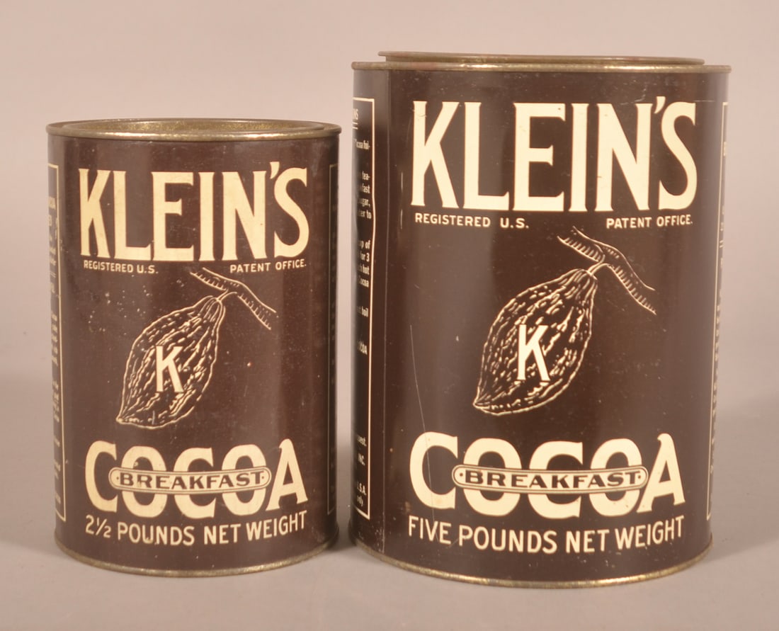 2 1/2 lbs. & 5 lb. Klein's Breakfast Cocoa Tins.: Both tins in very good condition with good gloss and color. Provenance: James Hoffman Collection. Larger tin, 8-1/2"H x 6-1/2"D