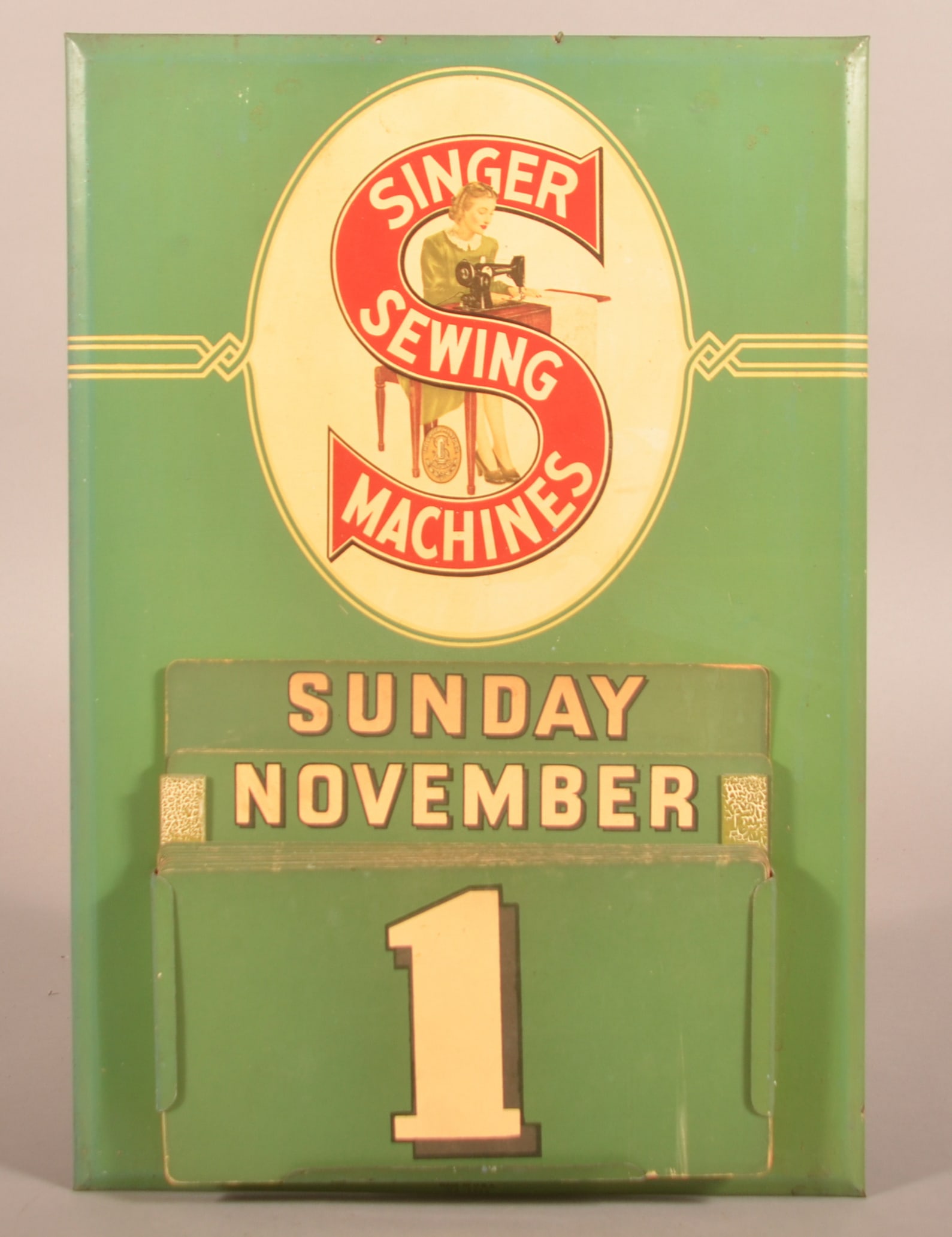 Singer Sewing Machine Tin Perpetual Calendar. (1 of 5)
