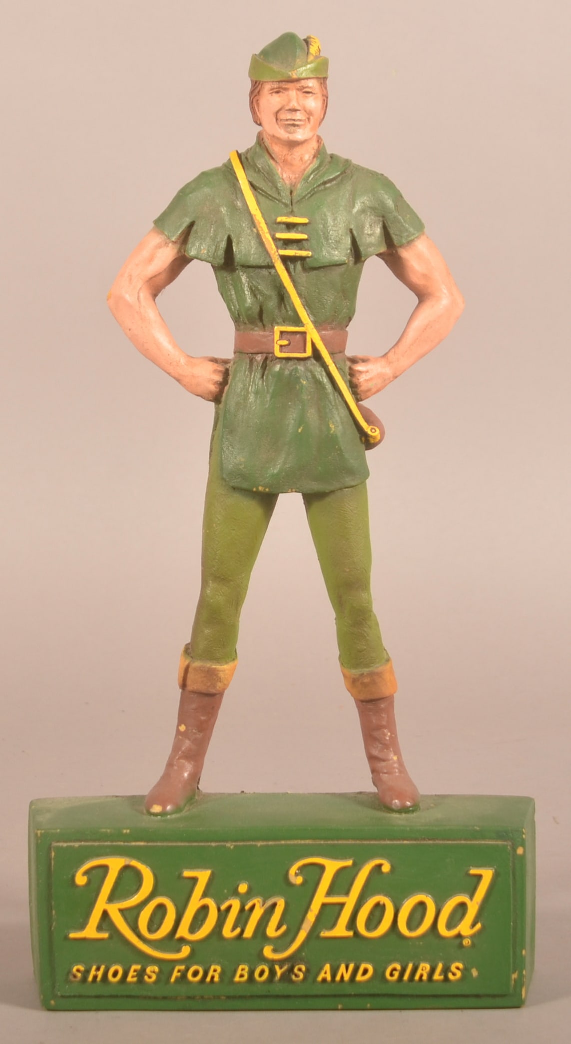 Vintage Robin Hood Figural Hanging Shoe Display.: Molded foam type material with advertising on base. Original hanger on back. 18"H x 9"W x 2-1/2"D