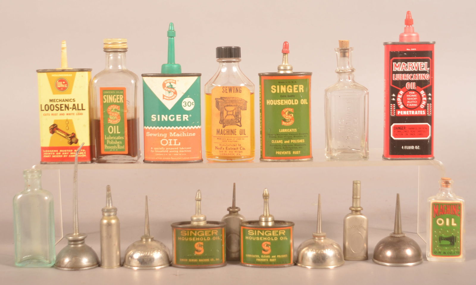 Collection of Vintage Handy Oilers.: Group includes lead top, plastic top and bottles. Highlights are the lead top Browning Gun Oil, the paper label Winchester Gun Oil bottle, lead top Hoppe's Lubricating Oil, and two small lead top Sing