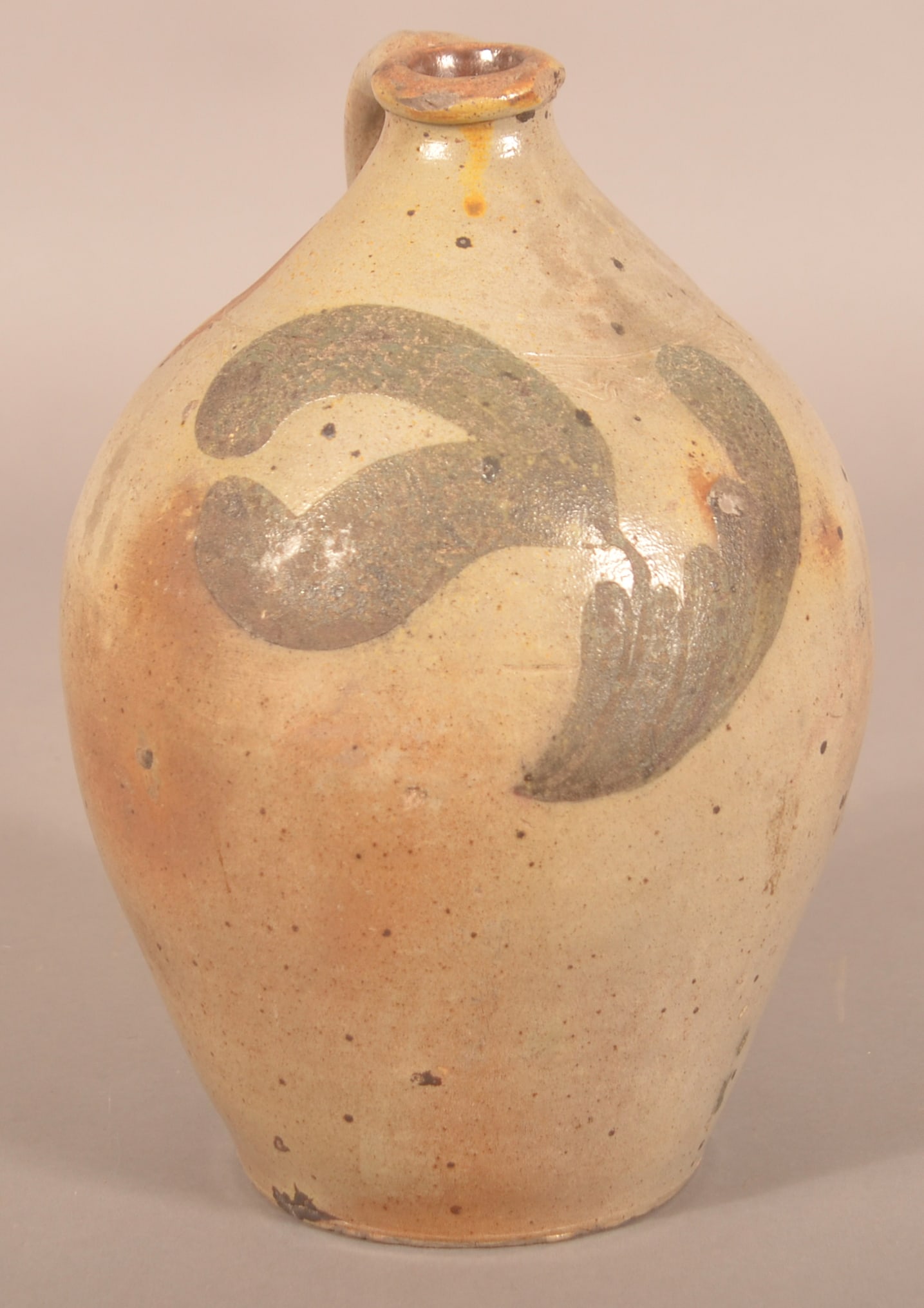 Small 1-Gallon Freehand Decorated Stoneware Jug.: Slightly ovoid with tooled decoration around shoulder of jug and freehand decoration. Top is slightly pushed down from weight in the kiln. 11"H x 4-1/2"D at base