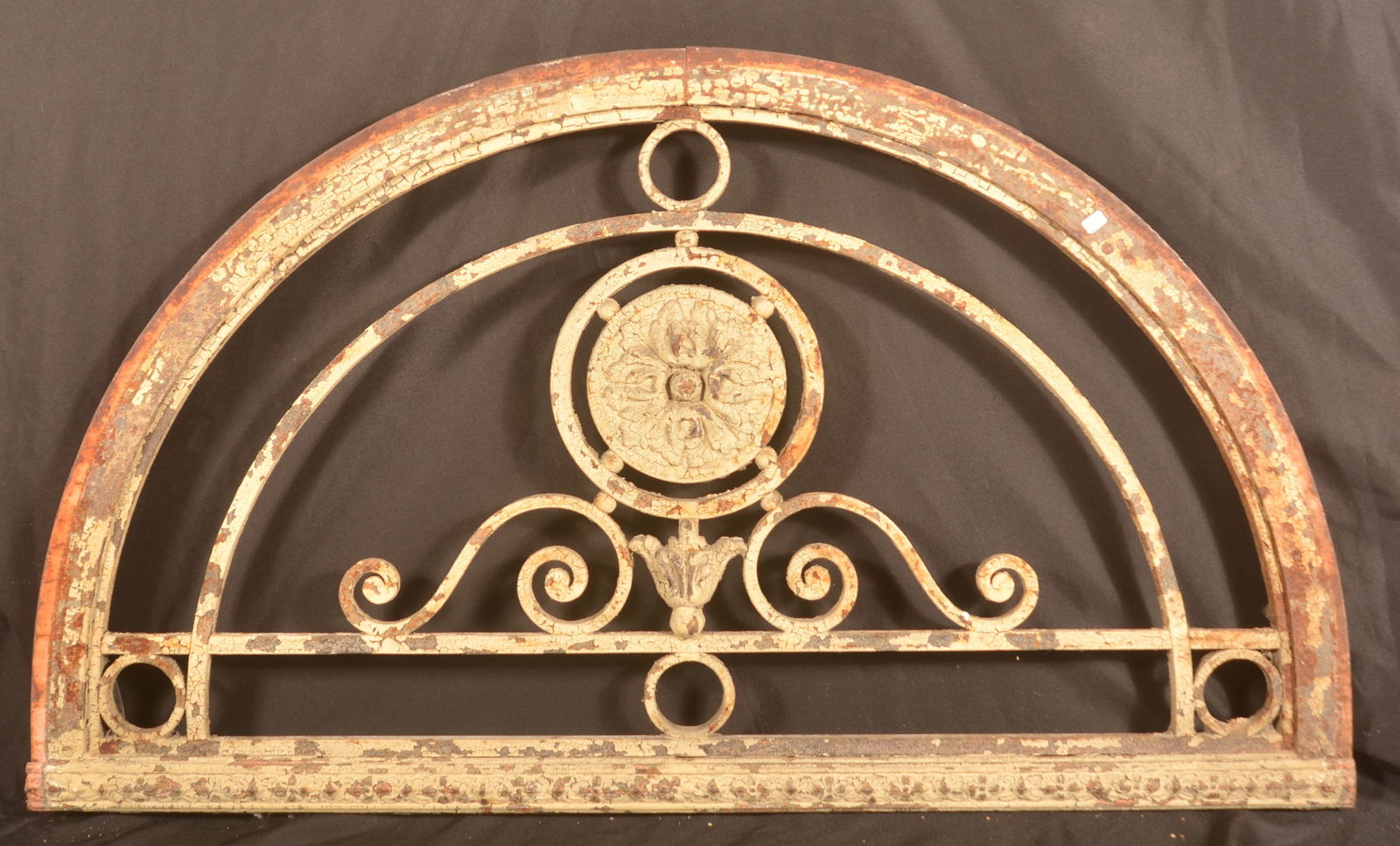 Ornate Cast Iron Window Grate.: 19th century. Cast iron grate with center medallion. 27"H x 45"W