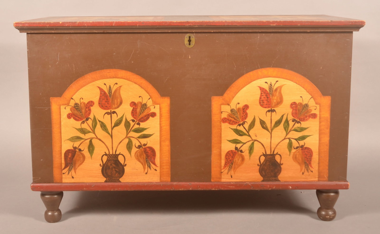 Dovetailed Blanket Chest w/ Folk Art Decoration: Turned foot poplar blanket chest, 1850-1860, with later hand-painted, potted tulip, paint decoration inside tombstones. Very well executed. 23 3/4"H x 38 1/2"W x 19"D