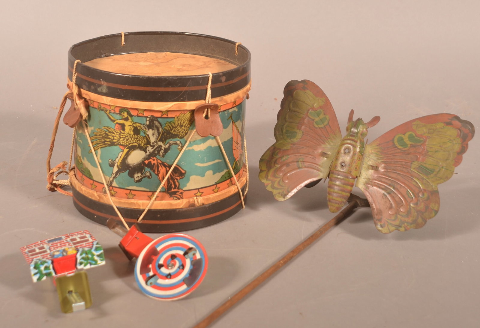 Lithographed Tin Toys Incl. Santa, Drum, Butterfly (1 of 7)