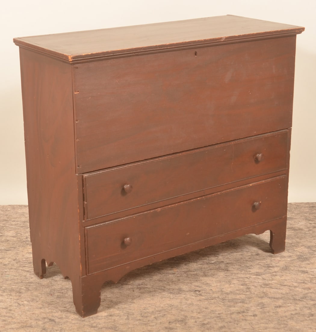 Berks County Paint-Decorated Mule Chest: Lift lid over 2 dovetailed drawers. Pine with square nail construction. Original dark red paint with black highlights. Shaped apron and feet. Original knobs and hinges. Beaded edge around drawer front
