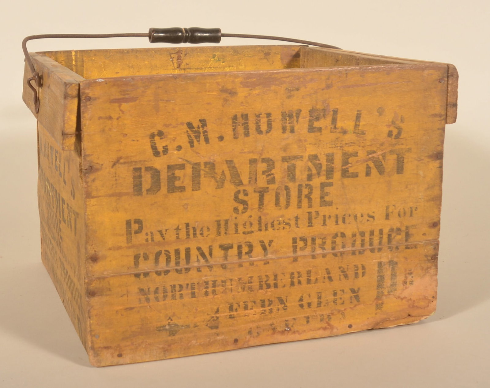 Antique Mustard Paint & Stenciled Egg Carrier: Original paint with black stencil advertising "C.M. Howell's Department Store" in Northumberland Fern Glen, PA. Wire and turned wood handle. 9 1/2"H x 13 3/4"W x 13 3/4"D