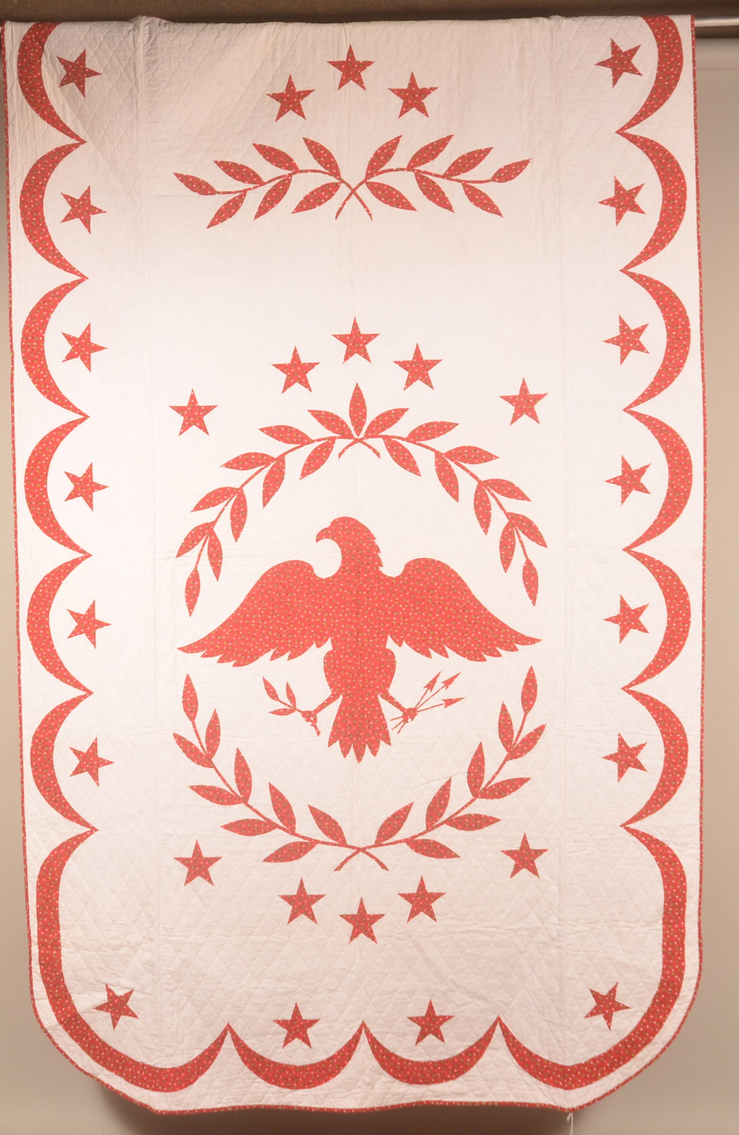 Excellent American Eagle & Stars Iowa Quilt: Great colors and design featuring a spreadwing US Eagle with laurel in the center surrounded by 10 stars, 3 stars at the top, 6 stars on each side and 4 stars across the bottom. Quite possible this is