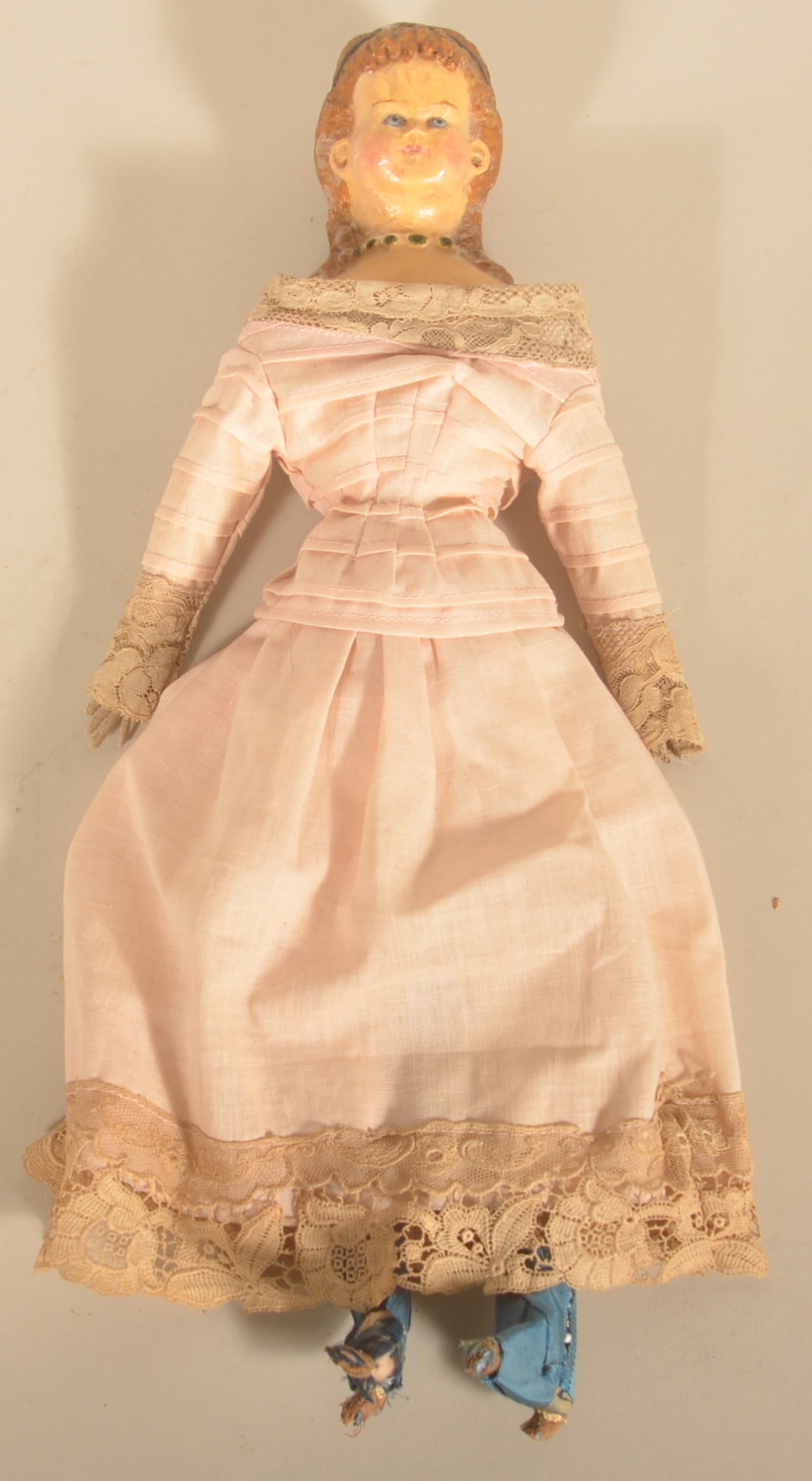 Antique Victorian Molded Wax Head Doll: 19th century with original clothes and silk shoes. Straw filled, painted features to head, sewn hands. 16"H