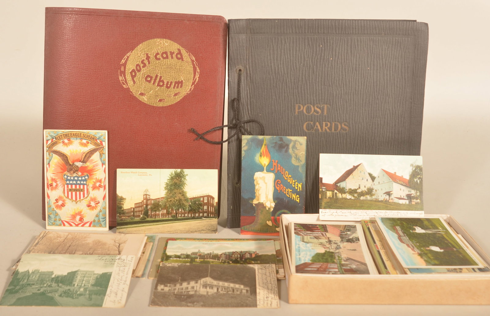 Lg. Group Ephrata RPPC & Souvenir Postcards: 2 albums and loose photos of RPPC of the Cloister, Cocalico Creek, a winter scene around Ephrata and Lancaster City. Souvenir postcards from California, Florida and Alabama and Christmas/Holiday postc
