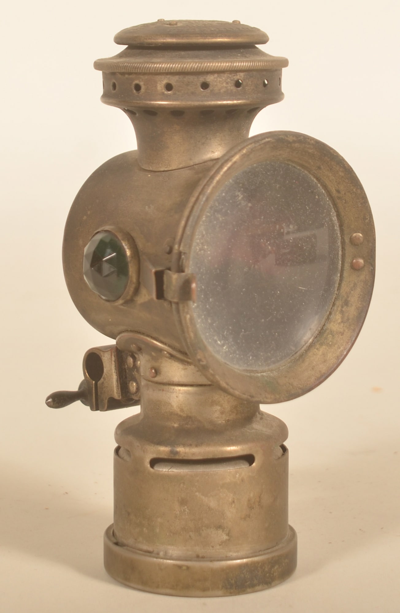 The Neverout Antique Nickel-Plated Bicycle Lamp: Made by the Rose Mfg. Co. from Philadelphia, PA. Original patina. 6 1/2"H