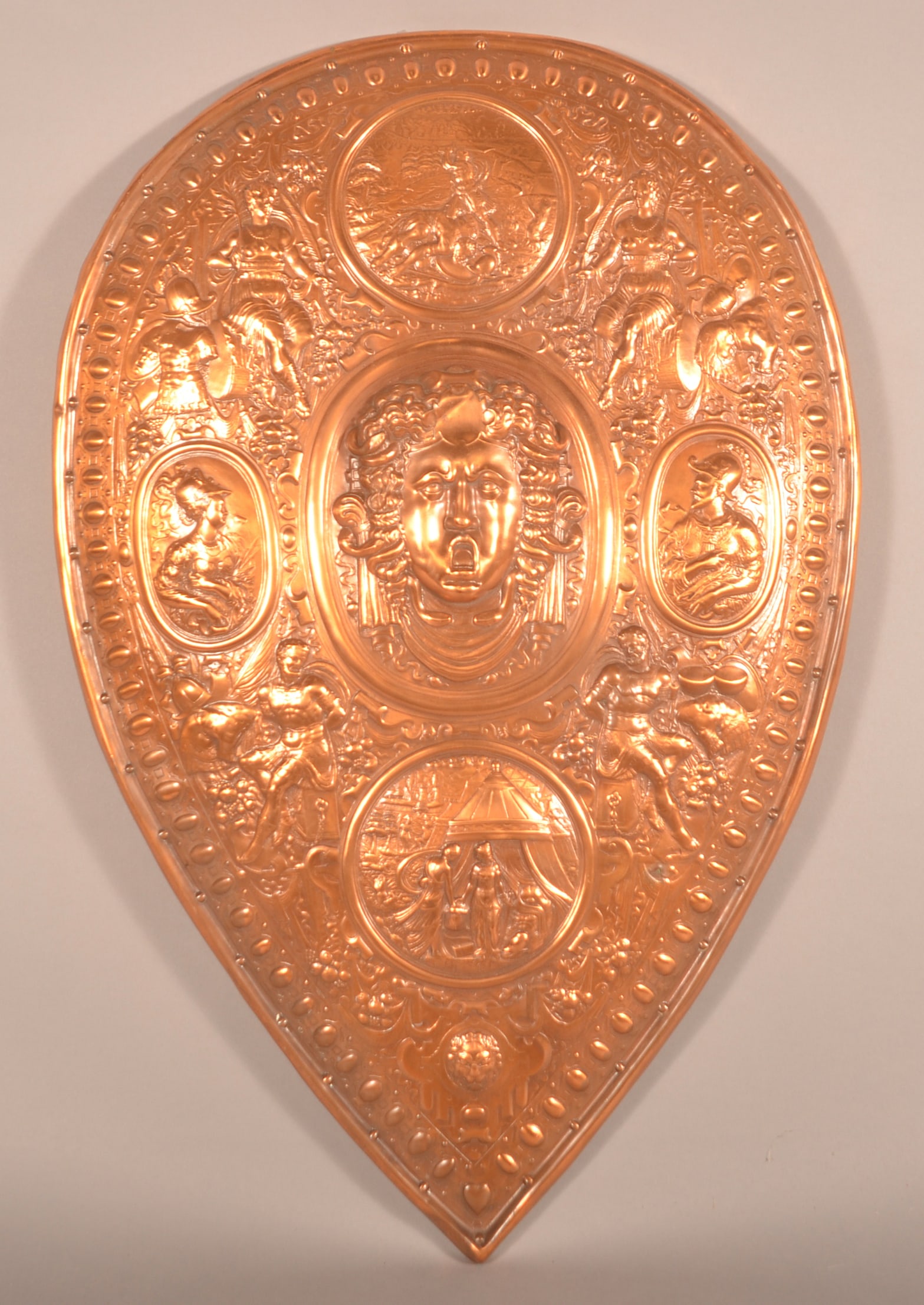 Wonderful Heavily Embossed Art Deco Copper Shield: Art Deco period copper shield, most likely hung above or around a fireplace. Incredible detail and scenery including a tiny heart at the bottom point. 29"H x 19"W