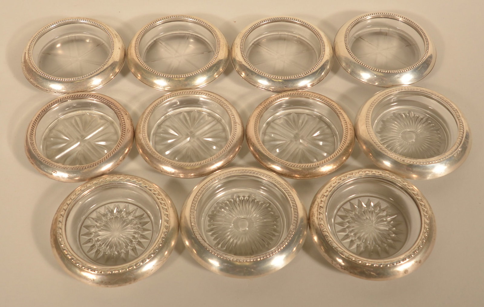 11 Sterling Silver Rimmed Cut Glass Coasters (1 of 1)