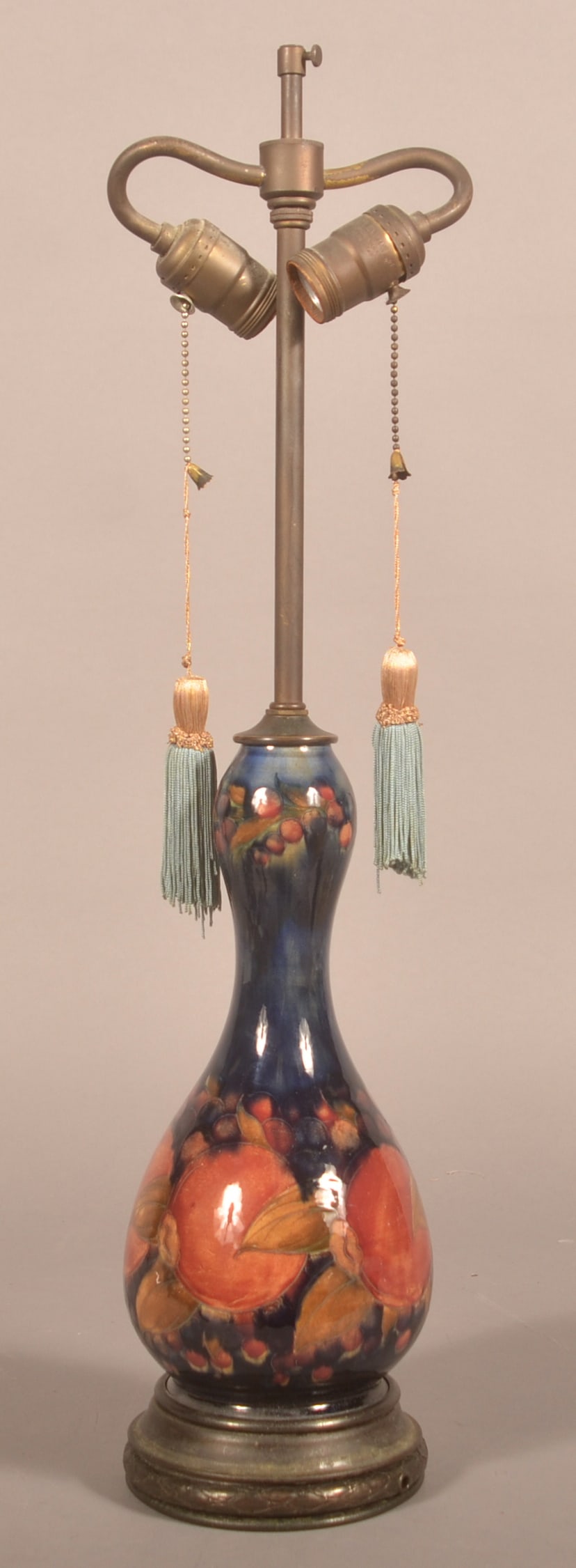Moorcroft Pottery & Brass Double-Socket Table Lamp: Beautiful floral decoration with the original tassles. No shade. 25 1/4"H