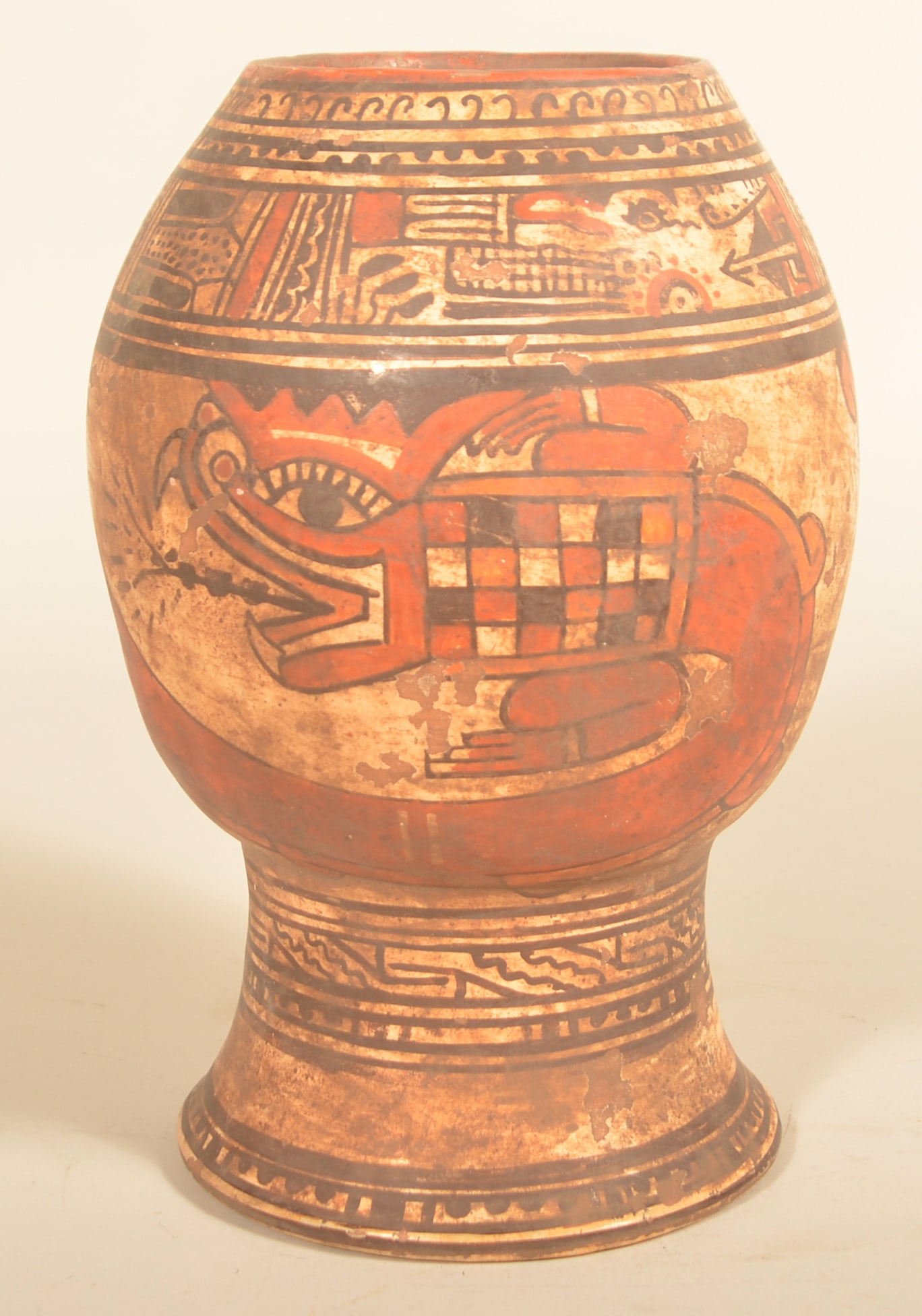 South American Pottery Vase: Hand-painted vase of undetermined age featuring serpents and abstract patterns. 11 1/4"H