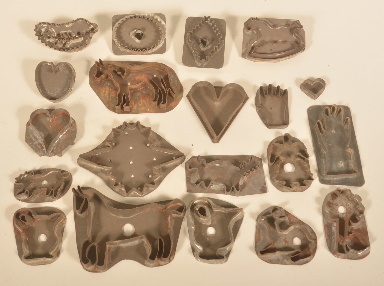 Great Group of Lancaster, PA Tin Cookie Cutters: Last group features some amazing shapes and sizes including a very large horse, North Star, a cat with a bushy tail, 2 hands, rocking horse, coffee pots and various size hearts from miniature to a min