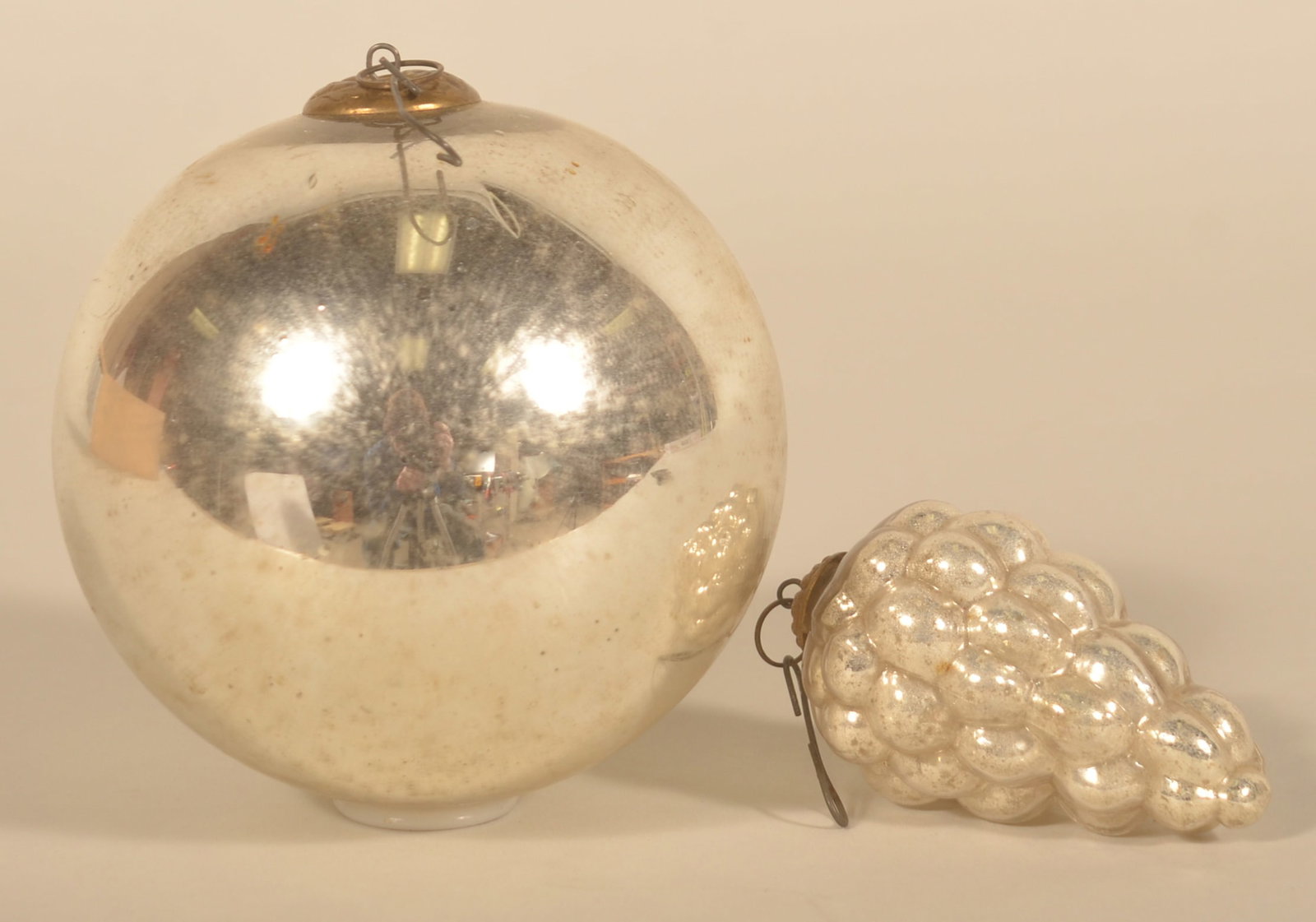 2 Antique German Christmas Tree Kugel Ornaments: Very nice small grapes and 4 1/2" round kugel. Stamped brass caps. From a local family that came with his parents when they immigrated from Germany at the turn of the last century. Grapes, 3 1/4"L