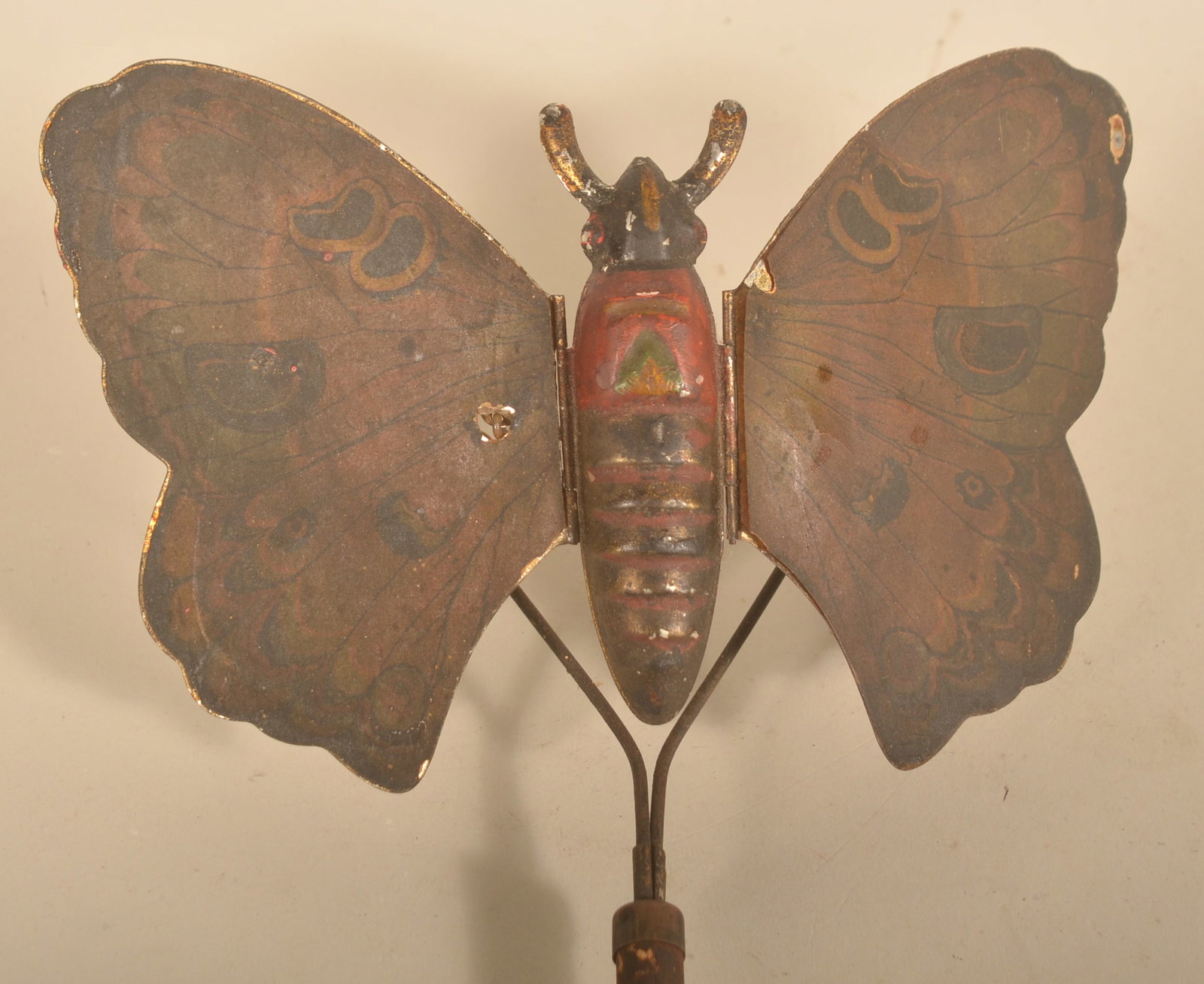 Antique Mechanical Butterfly Toy: Tin lithographed toy, wings move as you push the toy. 30"L