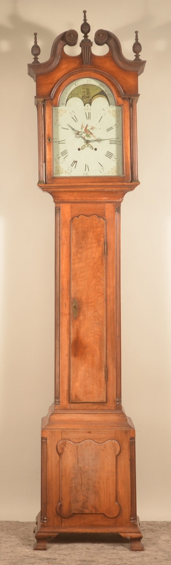 Early 19th C. English 8-Day Walnut Tall Case Clock: Signed on movement "Osborne Manufactory Birmingham England". Quarter columns, carved arched top door, turned column supports, molded ogee feet, scalloped raised panel base. Weight and pendulum are