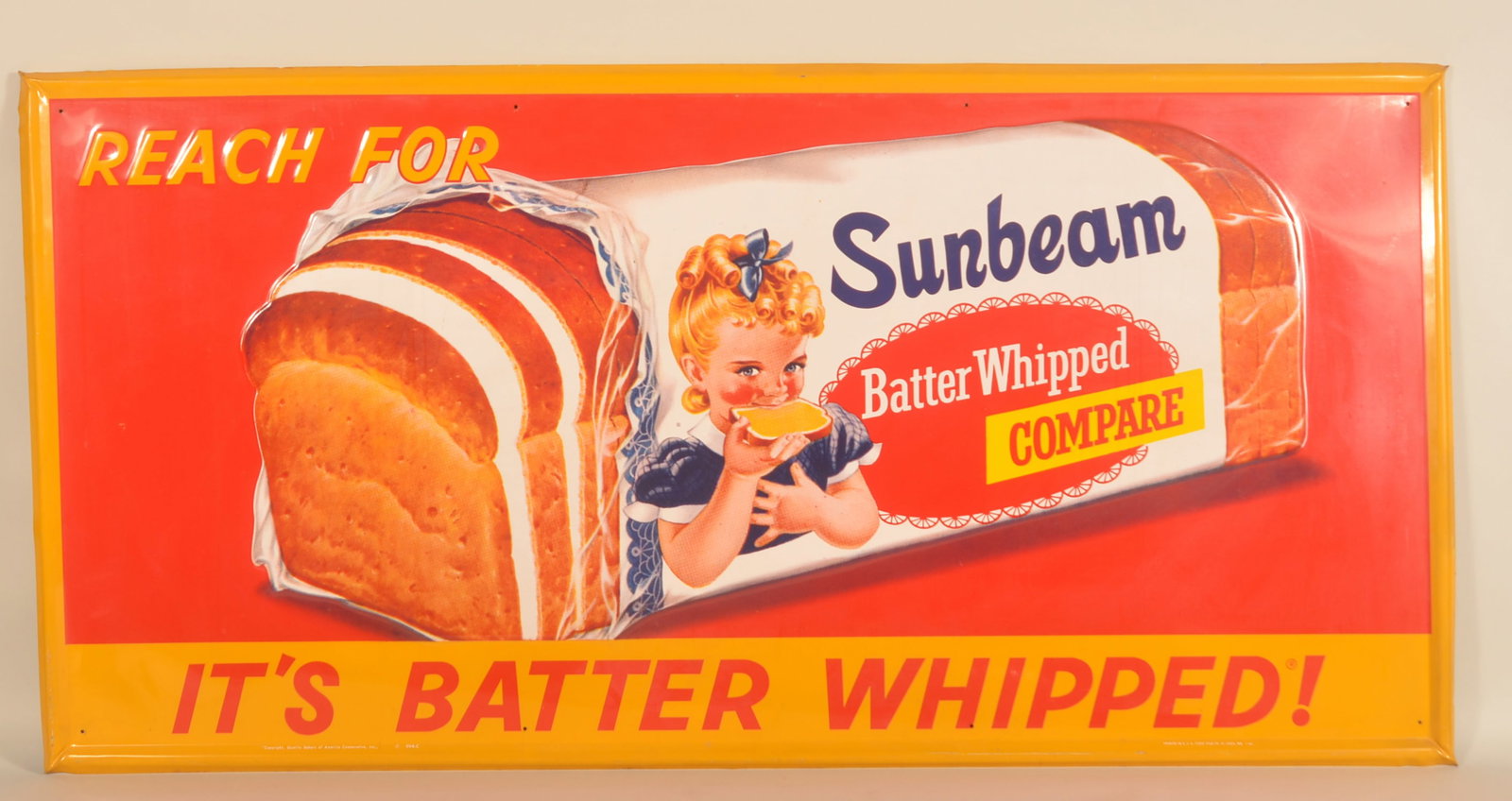 1966 NOS Embossed SST Sunbeam Bread Sign: Large self-framed Sunbeam "It's Batter Whipped!" sign marked in lower left with copyright information and Stout Sign Co. with1-66 date in lower right. NOS condition with bright colors and gloss. 35"H
