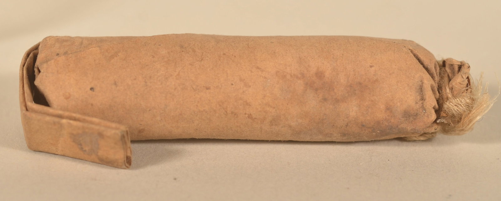 Springfield .58 Unused Paper Cartridge: Civil War cartridge used in large quantities by both sides. Top shelf example which, according to consignor, was a part of an original pack of 10. Purchased from Pack Horse Ford Relics. Provenance: Th