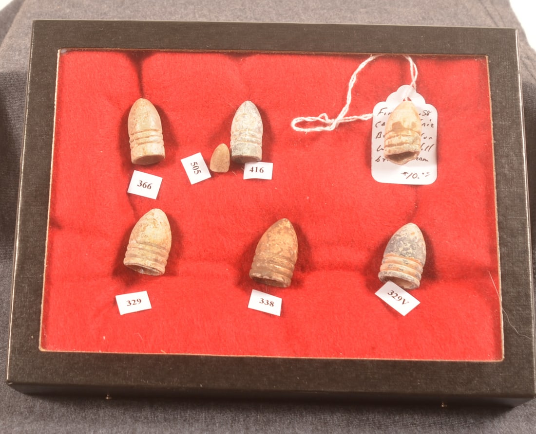Group of Union & Confederate Civil War Bullets: Seven projectiles total including .54 cal. CSA extra high base bullet, .58 cal. minie ball dug by Ken Bream at Wolf's Hill, .69 cal. minie ball from the Horse Soldier in Gettysburg, two other .69 cal.