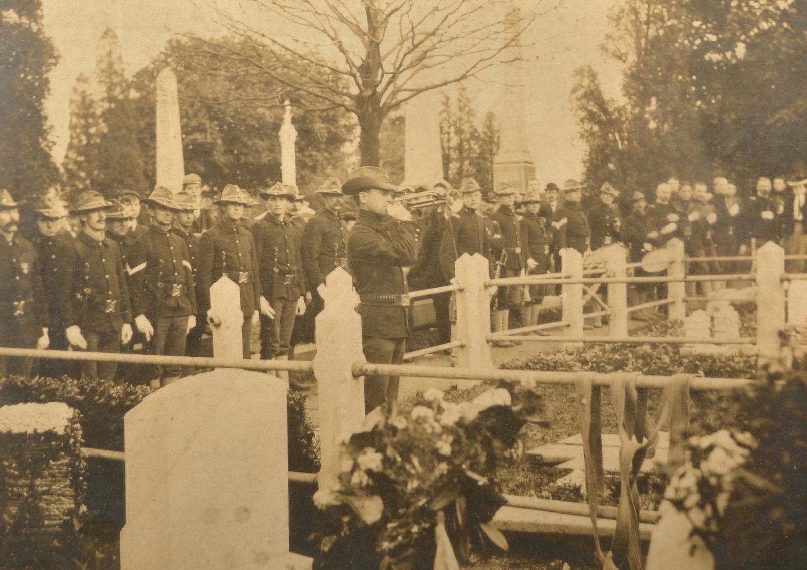 Lebanon, PA Framed Span Am War Army Funeral Photo: Large cabinet card in period frame. Not identified. Photographed by Harper, Lebanon. Poignant photo depicts a military funeral with the bugler blowing Taps and a large gathering of Army personnel. Wor