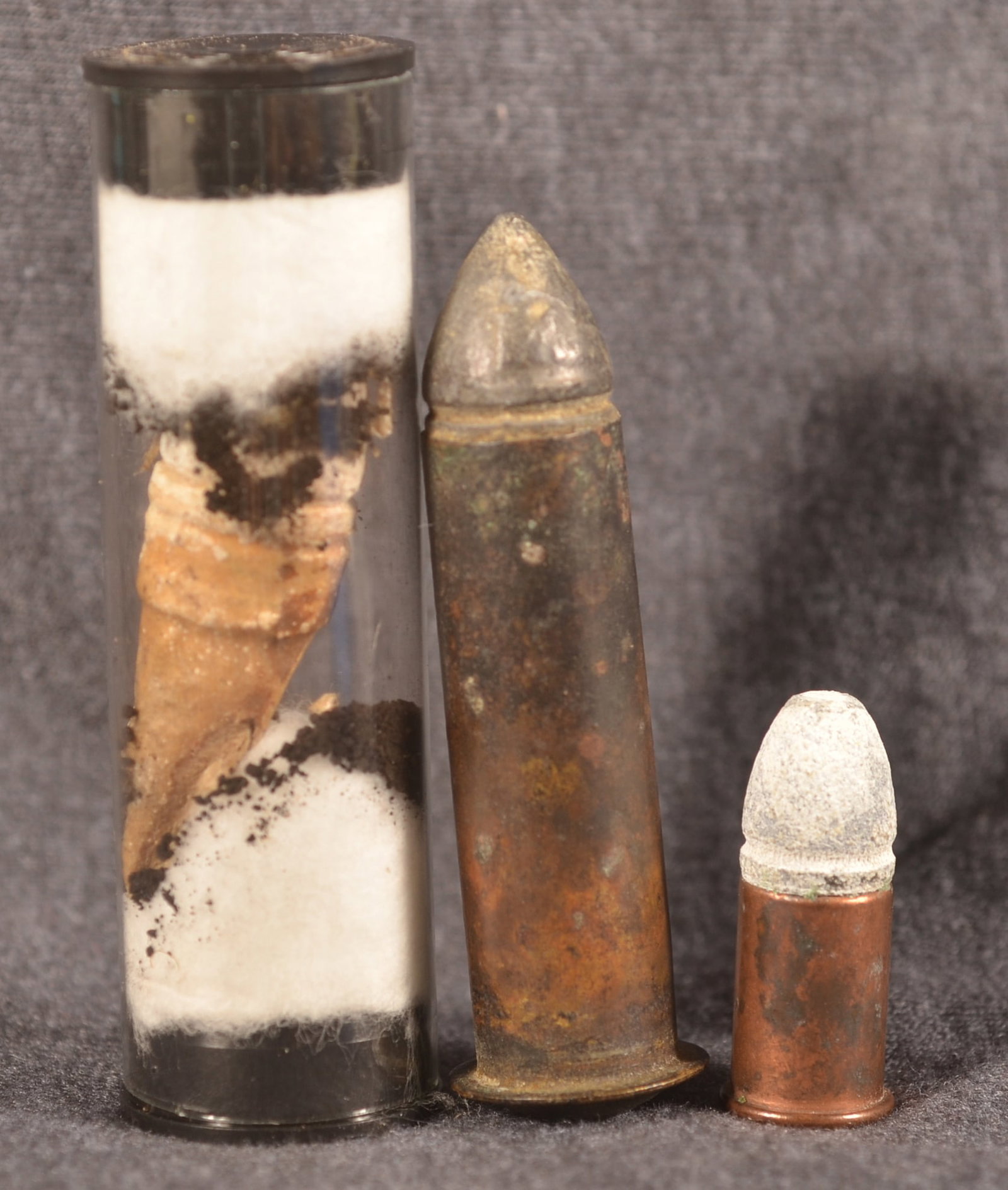 Civil War Billingshurst & Requa Cartridge & Others: Large .56 caliber Billingshurst & Requa battery gun cartridge, .44 cal. Henry cartridge, and a Johnson & Dow .58 cartridge. Provenance: The collection of Craig and Cynthia Wertz. Billingshurst cartrid
