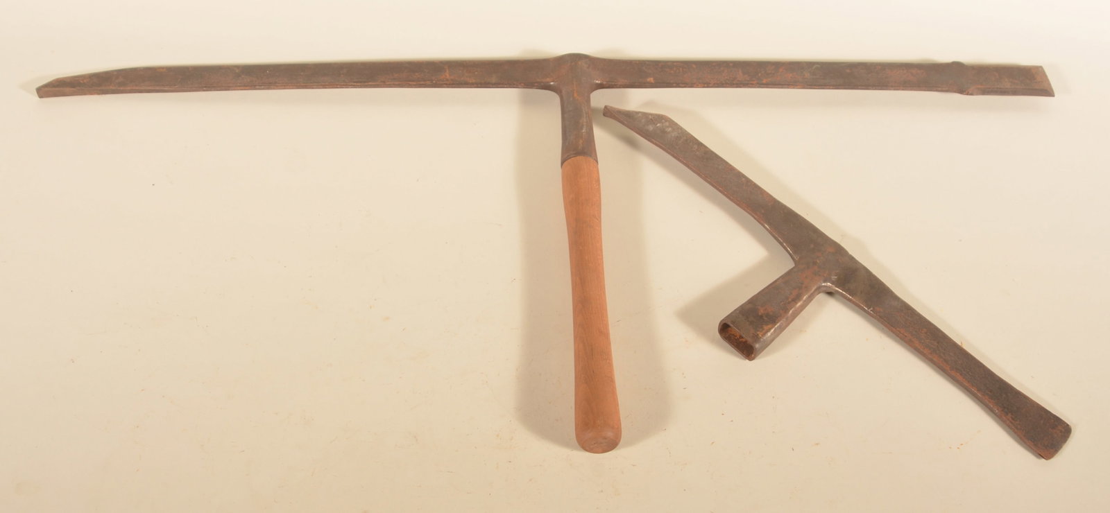 Two Blacksmith-Made Mortising Twybils: Smaller tool most likely made in Pennsylvania. Larger tool of the type typically found in France/Western Europe. Both 19th century. Larger, 43 1/2"W