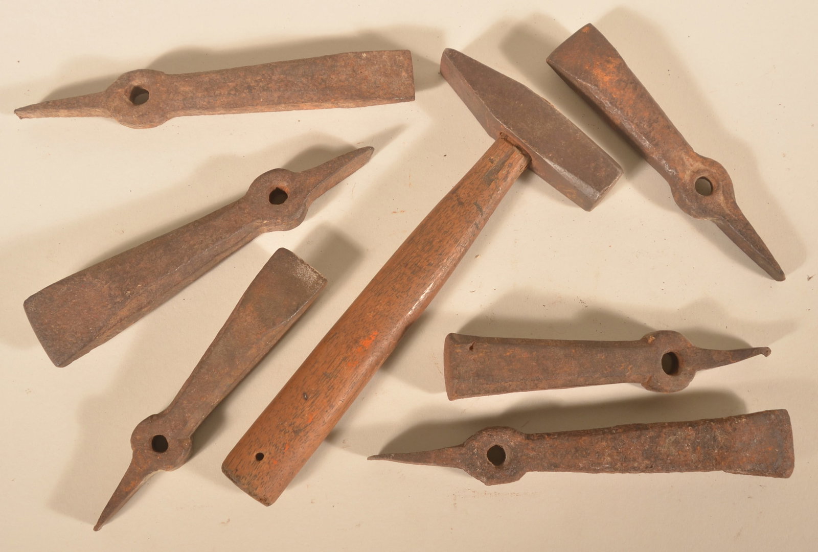 Signed Denglestock Hammer & Denglestocks: Hammer stamped "Germantown" on one side with original handle. Lot includes six unsigned denglestocks. Hammer, 10"L