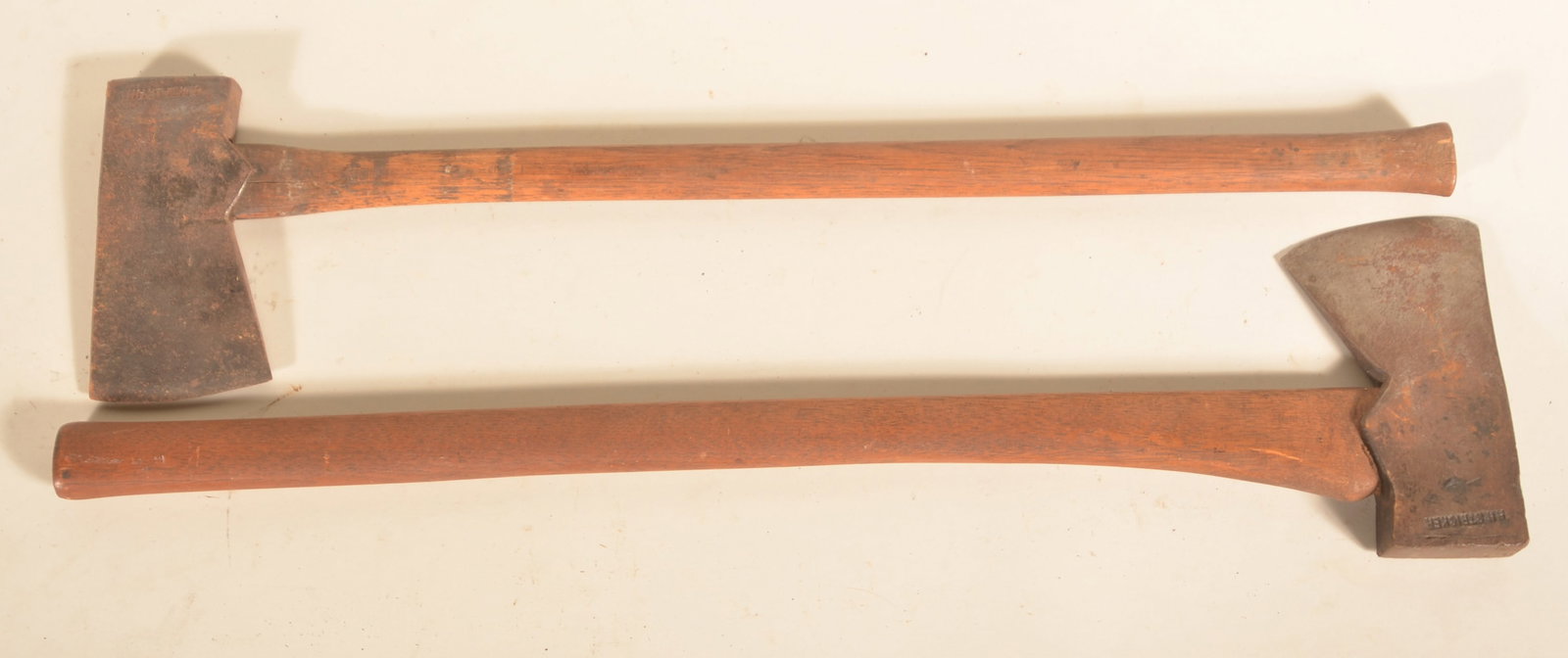Two Signed H.H. Stricker Berks County Felling Axes: Harvey H. Stricker (1859-1935), blacksmith who worked in Vinemont, Berks County, Pa. Both with a single stamp. 30"L