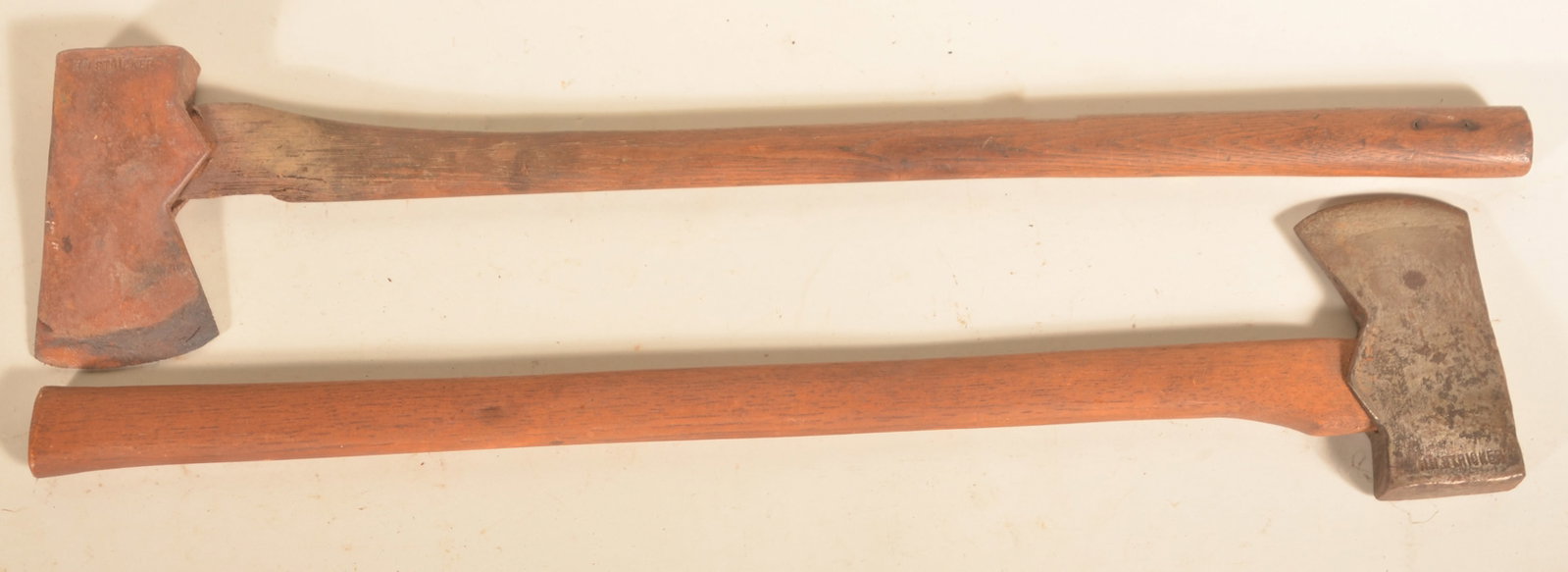 Two Signed H.H. Stricker Berks County Felling Axes: Harvey H. Stricker (1859-1935), blacksmith who worked in Vinemont, Berks County, Pa. Both with a single stamp. 30"L