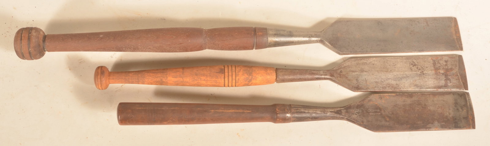 Three Signed Woodworking Slicks: Slicks are signed "P.S. & W Co", "HH Co Middletown CT" and "Underhill Edge Tools". 35"L