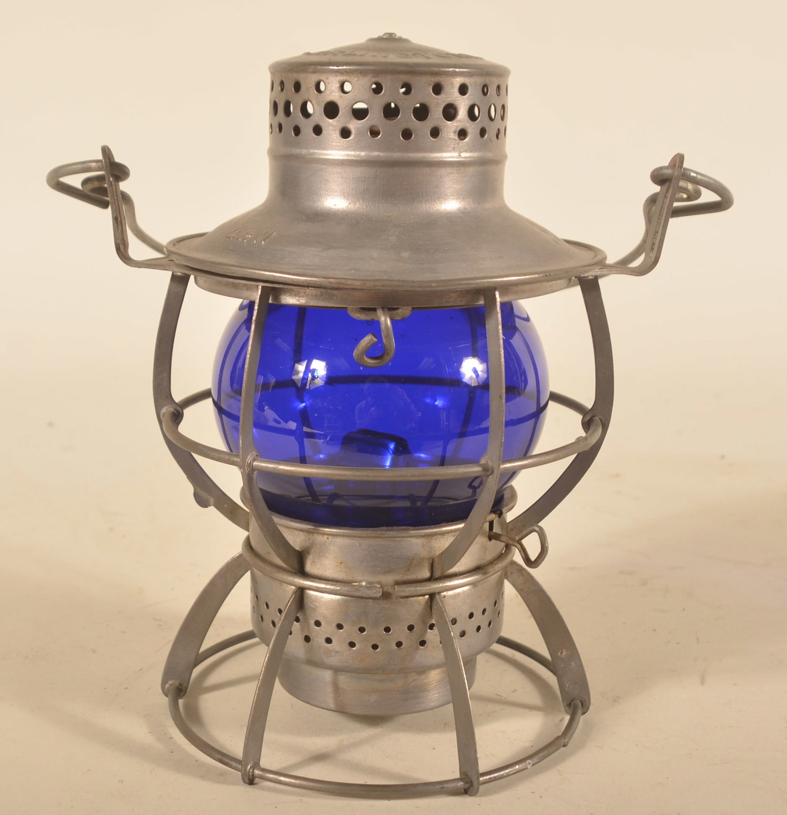 Louisville & Nashville Dressel Railroad Lantern: Embossed "L & N" on top. Dark cobalt blue globe with backwards "K' emblem. 14 1/2"H