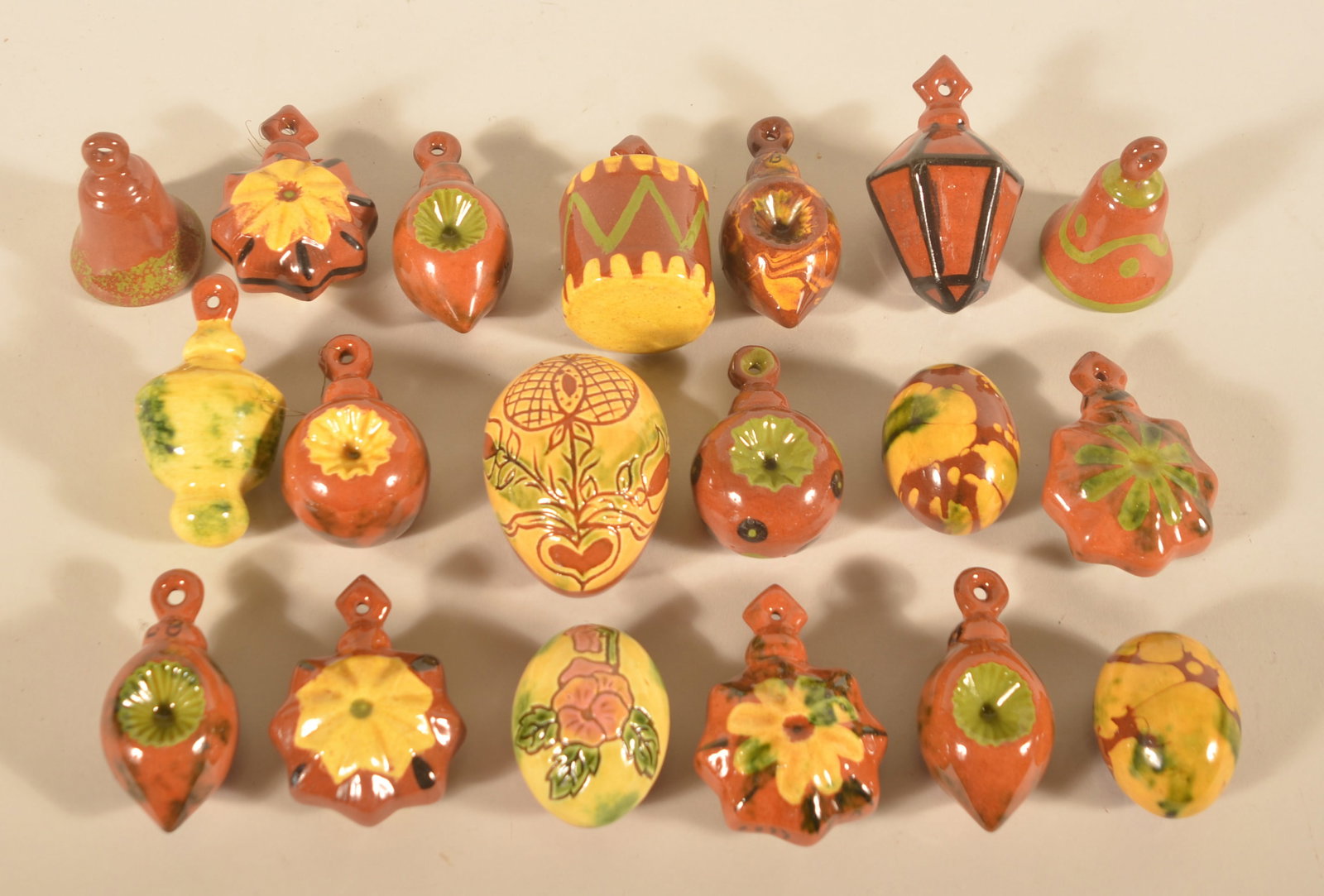 Breininger Figural Christmas Ornaments & Eggs: 15 unusual redware figural Christmas ornaments initialed and dated by Lester Breininger together with 4 Easter eggs. Figural ornaments, 3 1/4"H