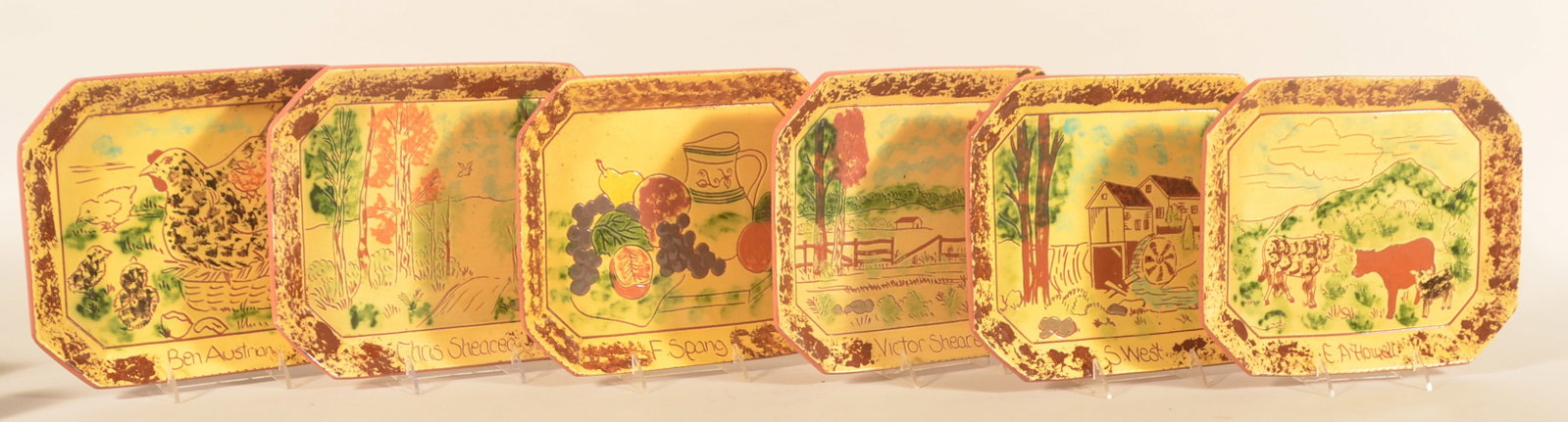Unusual Breininger "Artist Series" Redware Plates: Produced in 1987, these raised edge platters each feature a different noted Berks County artist with their name noted along the bottom edge. The decoration on each platter is an homage to the artist b