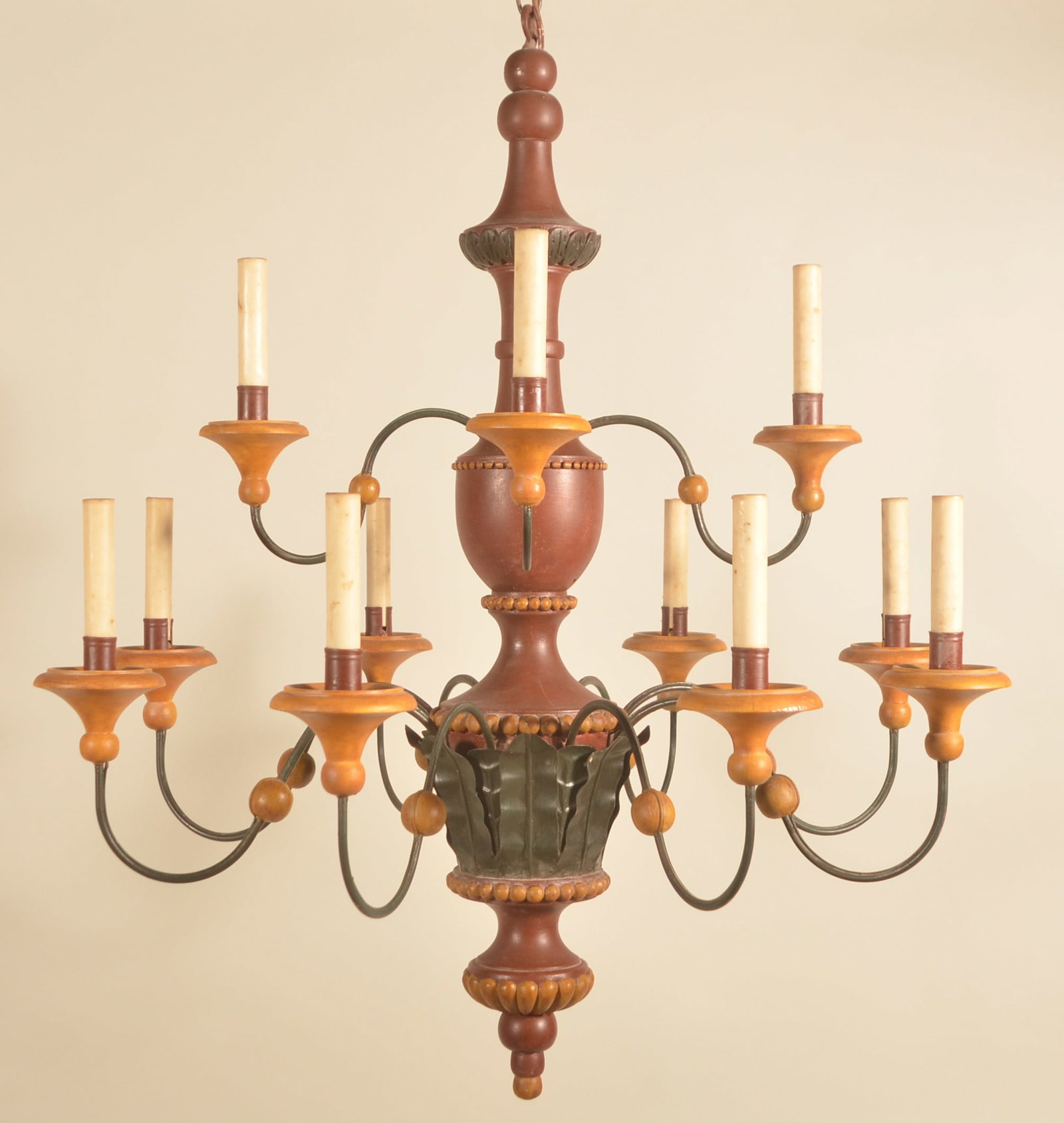 Excellent Jerry Martin 4-Over-8-Arm Chandelier: 2-tier electrified chandelier in tin and wood signed Jerry Martin. Painted red with mustard highlights. Center post is an urn and ball shape with graduated balls hanging from the base. 36"H x 31"D