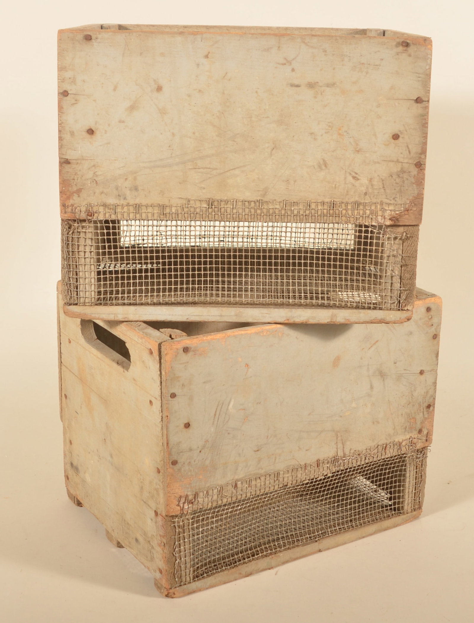 Pair of Robin's Egg Blue Apple Crates: 1920s apple crates made of pine and wire mesh with the original Robin's egg blue paint. 11 3/4"H x 15"W x 11 3/4"D