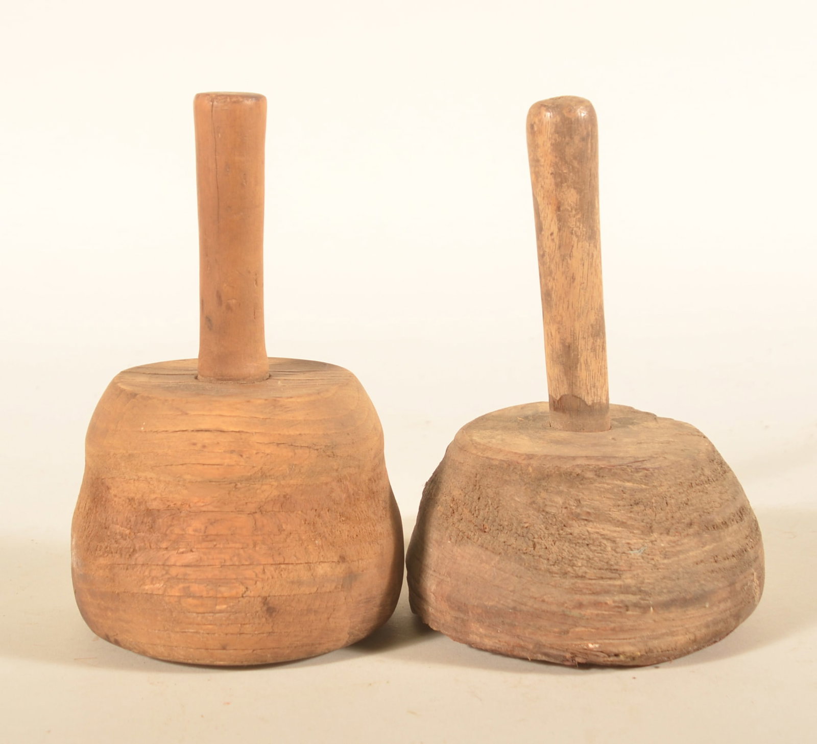Two Primitive Carved Round Wood Mallets: Great primitives. One shaped like a beehive. Found in Lancaster County. 8"H