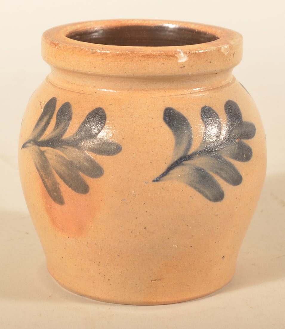 5 3/4" Freehand-Decorated Stoneware Crock: Sweet little stoneware crock, mid-Atlantic region, likely Philadelphia. Freehand decorated floral flourishes around the shoulder of the crock. Very nice contrast. Crocks under 6" always popular with c