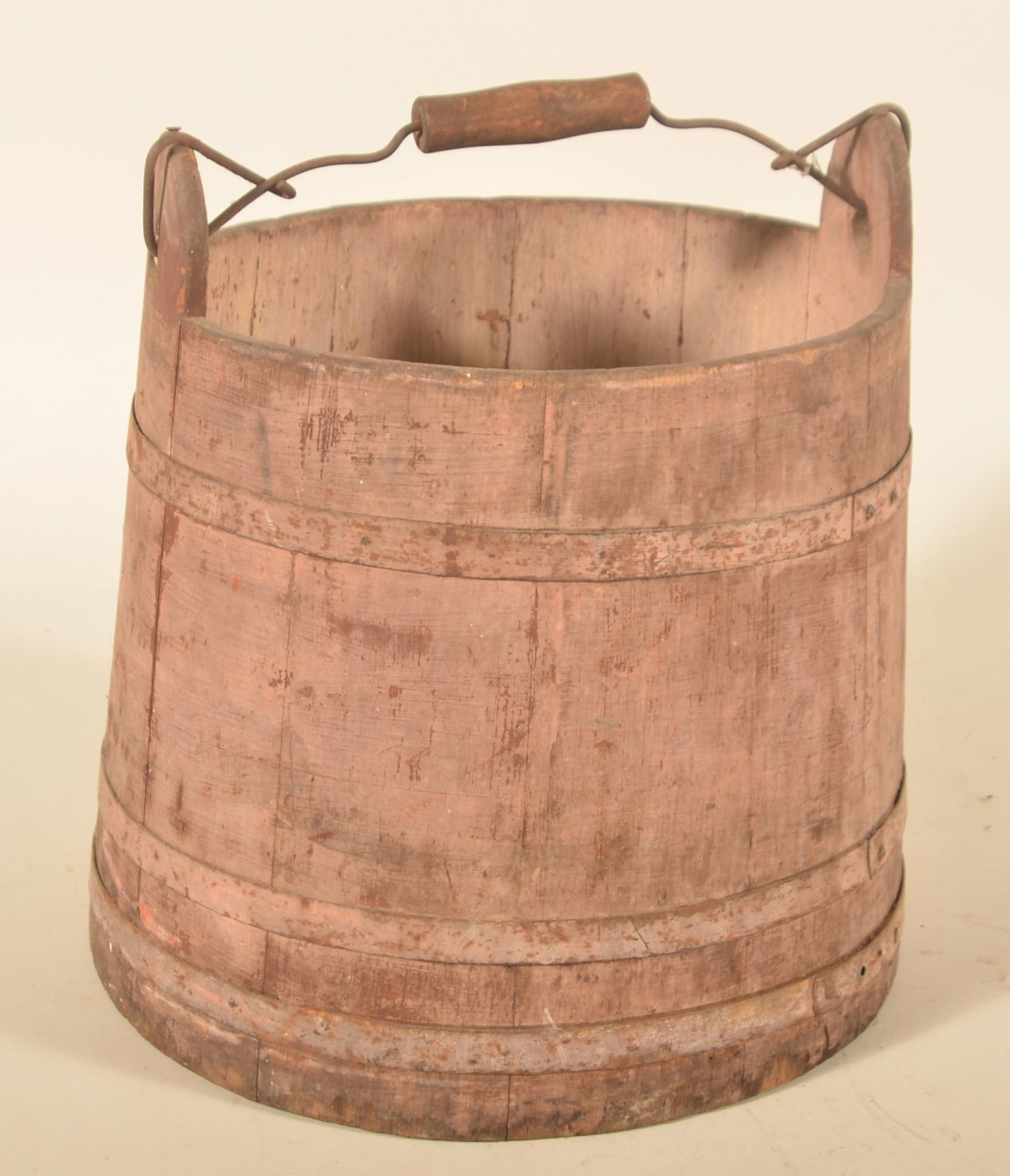 Painted Primitive Wood Wash Bucket: New England bucket with metal bands. The original red paint is bleeding through the white overpaint. Nice dry primitive look with make-do handle. 14"H x 11 1/2"D
