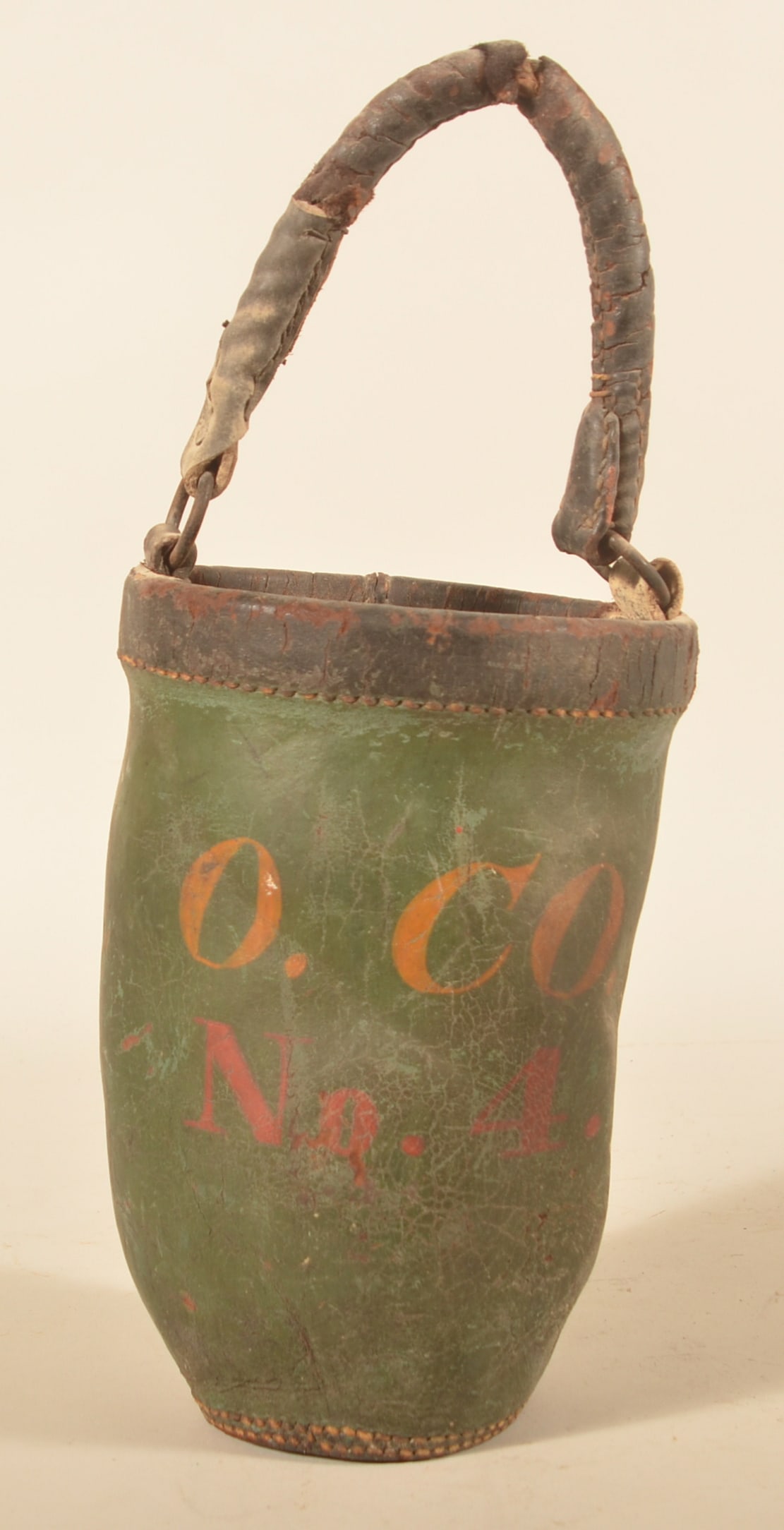 Antique Paint-Decorated Leather Fire Bucket: From a house in Manheim Township is this Federal period leather fire bucket with original Windsor green paint and leather handle. Hand-painted on front "O CO No.4" in mustard and red. Proximity to whe