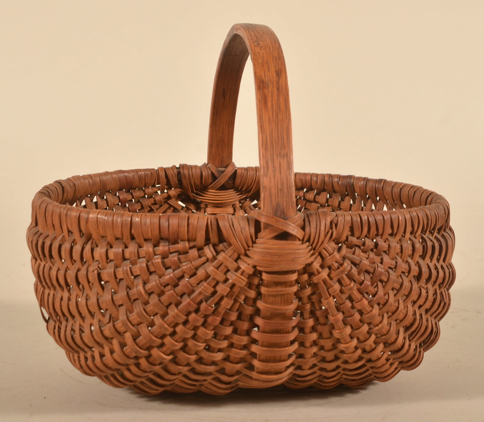 Antique Splint Oak Egg Basket: Carved oak handle Pennsylvania basket with warm patina. 8"H x 9"L